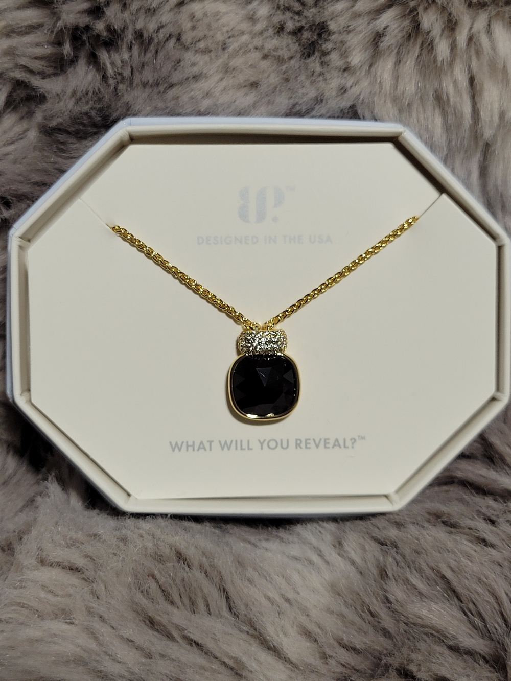 Gold-Tone Necklace with Black Faceted Pendant and Crystal Accents
